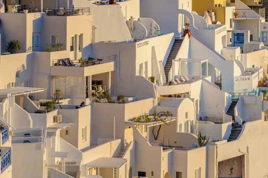 Typical view of Fira village patios at sunset, Santorini island, Greece