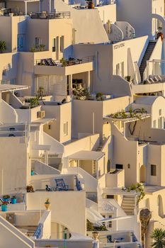 Typical view of Fira village patios at sunset, Santorini island, Greece