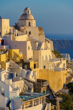 Typical view of Fira village patios at sunset, Santorini island, Greece
