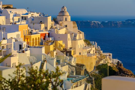 Typical view of Fira village patios at sunset, Santorini island, Greece