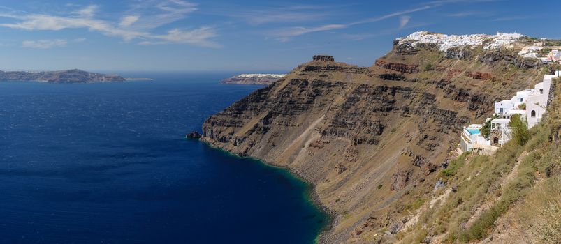 Typical view from Fira village to caldera sea and other villages, Santorini island, Greece