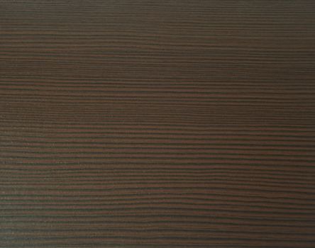 Decorative surface imitating the texture of dark wood of the oak wenge. Close-up