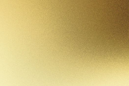 Abstract texture background, light shining on rough golden metal wall