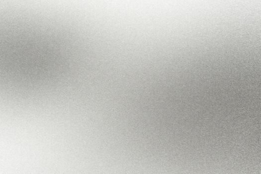 Abstract texture background, light shining on rough silver metal wall