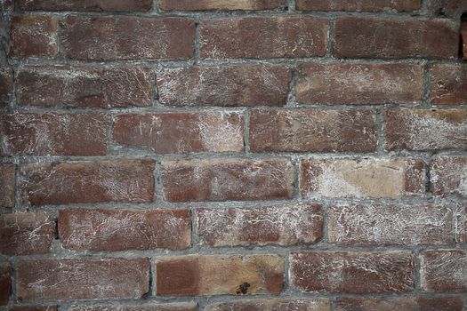 Destroyed brick wall, red texture grunge background