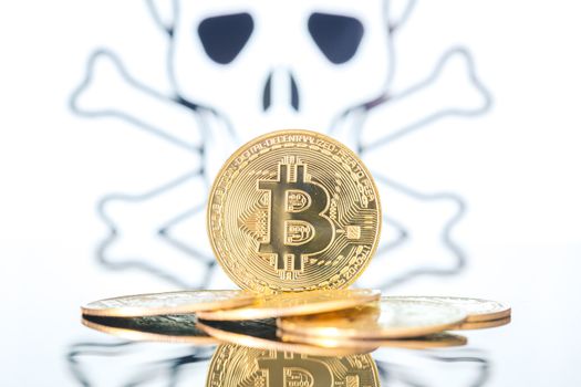 Bitcoin fail concept, Golden bitcoin with skull and bones in the background. White background