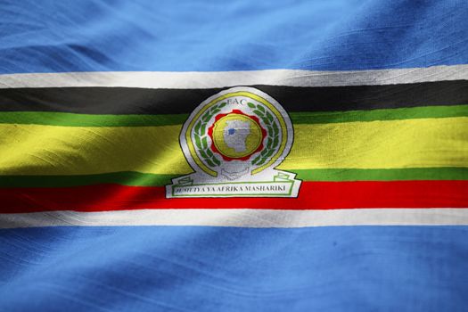 Closeup of Ruffled East African Community Flag, East African Community Flag Blowing in Wind