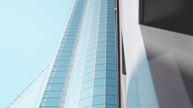 Bottom view of modern skyscrapers in business district against blue sky - closeup background