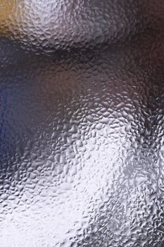 Water drops on glass window close up with blurred background. Drops in macro. Condensate on window closeup. Wet air.