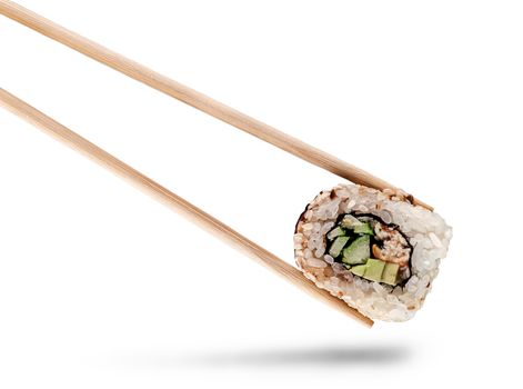 Sushi roll of california with chopsticks isolated on white background