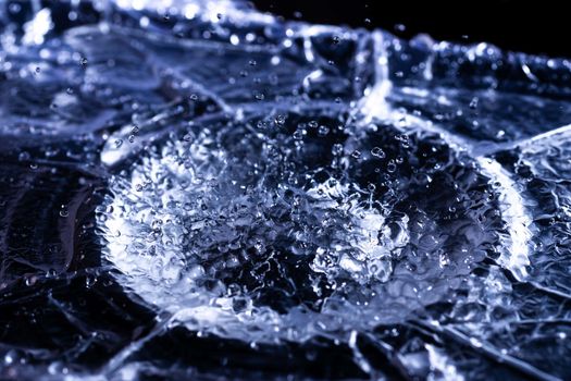 Water drops splashing on acoustic membrane. A lot of drops in air. High frequency of sound waves. Water cloud small drops. Frozen time shot. 