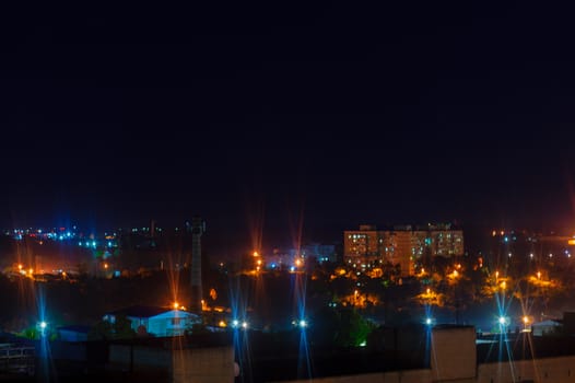 Long exposure night photo. A lot of stars with trees on foreground. Far from the city. Night landscape.