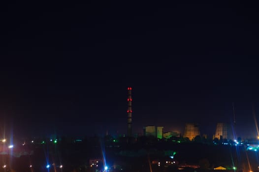 Long exposure night photo. A lot of stars with trees on foreground. Far from the city. Night landscape.