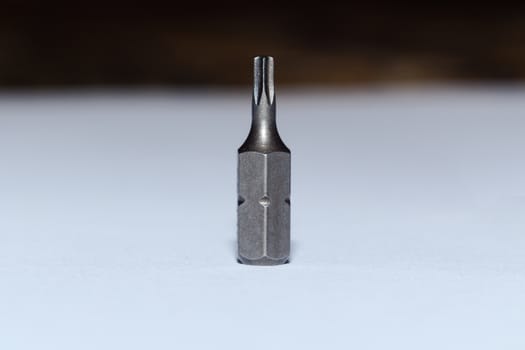 One tool bit on blurred background.