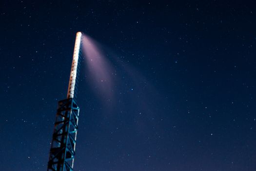 Long exposure night sky stars photo. Boiler tube on foreground. A lot of stars with constellations. Far from the city. Night landscape.