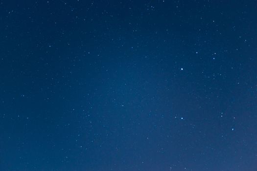 Long exposure night sky stars photo. A lot of stars with constellations. Far from the city. Night landscape.