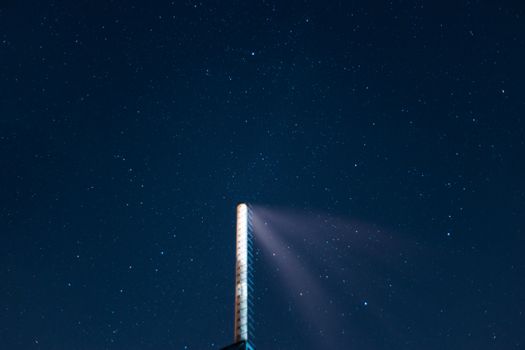 Long exposure night sky stars photo. Boiler tube on foreground. A lot of stars with constellations. Far from the city. Night landscape.