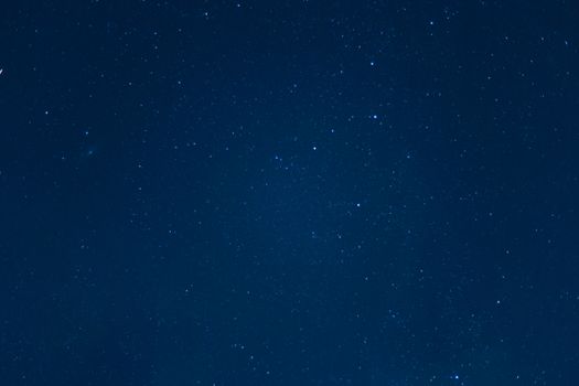 Long exposure night sky stars photo. A lot of stars with constellations. Far from the city. Night landscape.