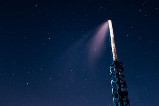 Long exposure night sky stars photo. Boiler tube on foreground. A lot of stars with constellations. Far from the city. Night landscape.