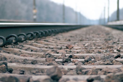 Low side shot of rail rails. Defocused to infinity railway.