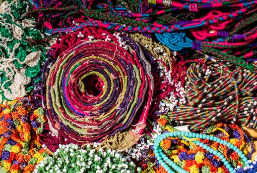 Colorful beads of various color at a market