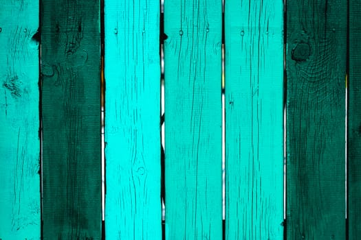 painted fence of wooden boards