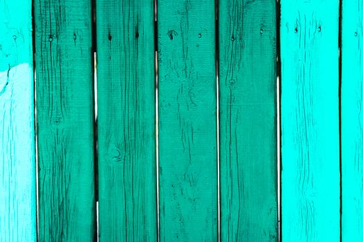 painted fence of wooden boards