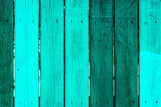 painted fence of wooden boards