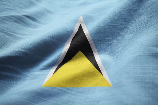 Closeup of Ruffled Saint Lucia Flag, Saint Lucia Flag Blowing in Wind