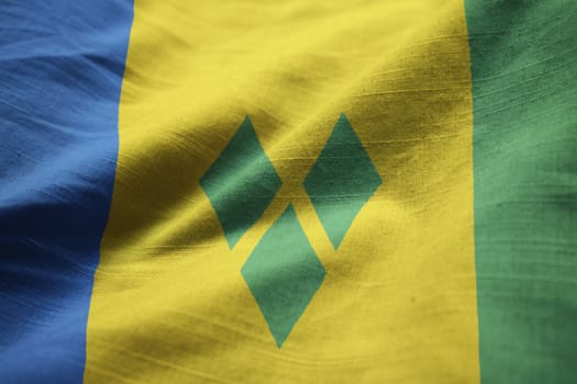 Closeup of Ruffled Saint Vincent and the Grenadines Flag, Saint Vincent and the Grenadines Flag Blowing in Wind