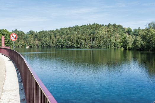 Lake Robertville is an artificial lake near the city of Malmedy in Belgium in Europe. The water volume is 8,000,000 m3 and the area is 0,62 km2. The lake is located in the High Fens park. The dam on the river Warche was built in 1928.