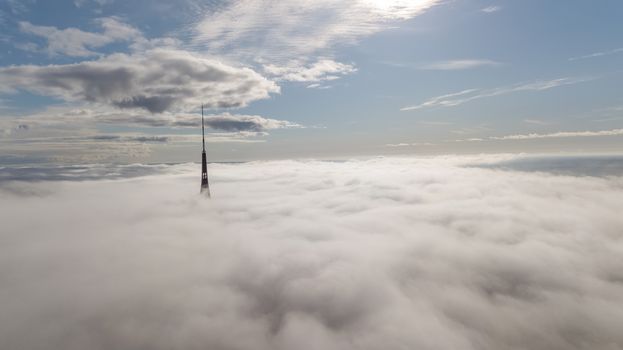 Riga Latvia Tv Tower Zakusala smoke clouds Europe biggest Aerial drone top view