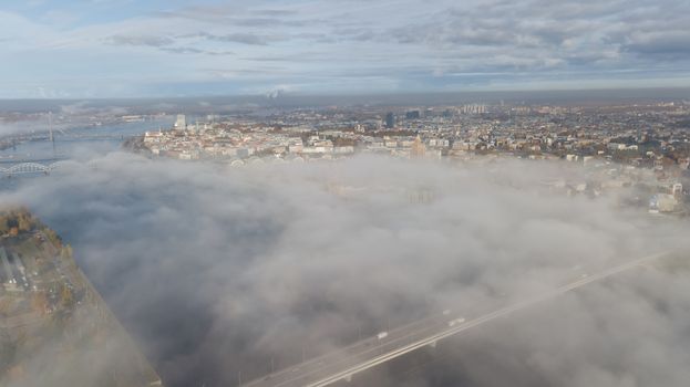 Riga Latvia Daugava river Zakusala island smoke cloud island Aerial drone top view