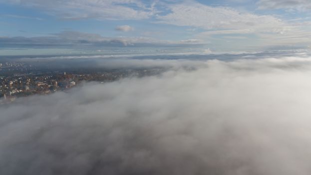 Riga Latvia Daugava river Zakusala island smoke cloud island Aerial drone top view