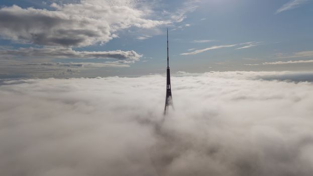 Riga Latvia Tv Tower Zakusala smoke clouds Europe biggest Aerial drone top view