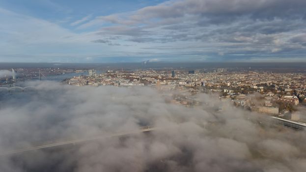 Riga Latvia Daugava river Zakusala island smoke cloud island Aerial drone top view