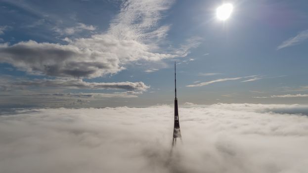 Riga Latvia Tv Tower Zakusala smoke clouds Europe biggest Aerial drone top view