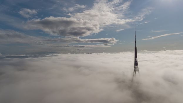 Riga Latvia Tv Tower Zakusala smoke clouds Europe biggest Aerial drone top view