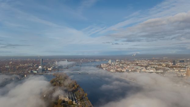 Riga Latvia Daugava river Zakusala island smoke cloud island Aerial drone top view