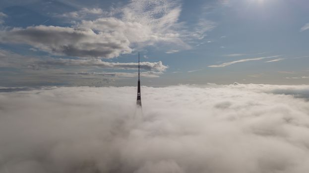 Riga Latvia Tv Tower Zakusala smoke clouds Europe biggest Aerial drone top view