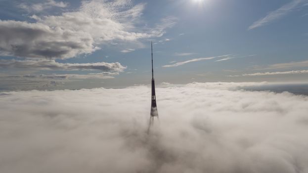 Riga Latvia Tv Tower Zakusala smoke clouds Europe biggest Aerial drone top view