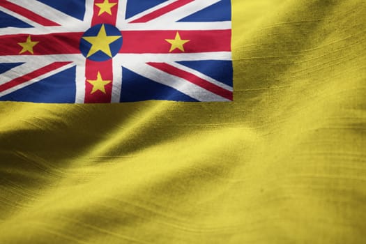 Closeup of Ruffled Niue Flag, Niue Flag Blowing in Wind