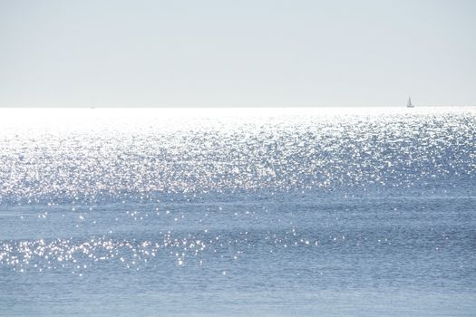 Simple sparse image of bright and sunny sea with horizon on a winter day in Mallorca, Spain