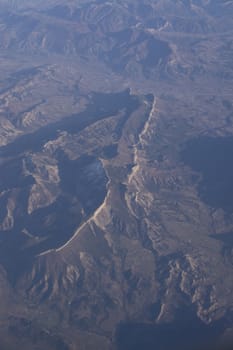 Rugged mountain landscape with escarpment in southern Swiss Alpes, Europe on a sunny winter day