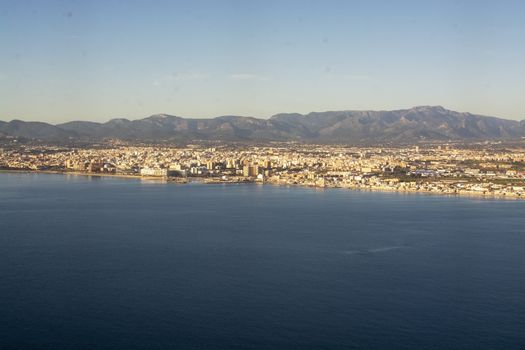 Aerial view of Portixol and Molinar coastline on a sunny winter day in December in Palma de Mallorca, Spain.