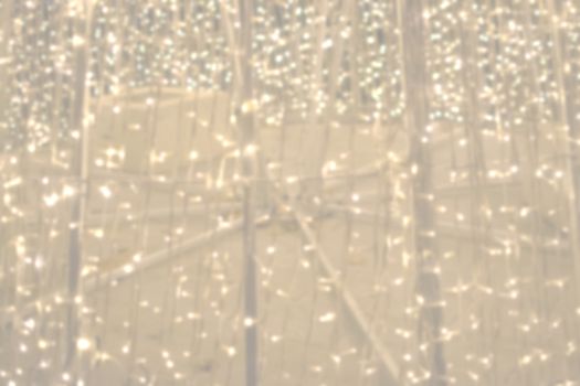 Abstract golden background texture with string lights New Years Eve backdrop