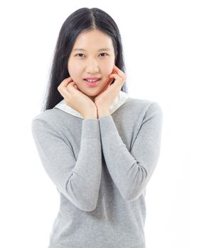 Teenage Asian high school girl, hands on chin