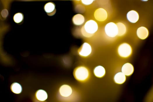 Bokeh lights defocussed festive winter background texture