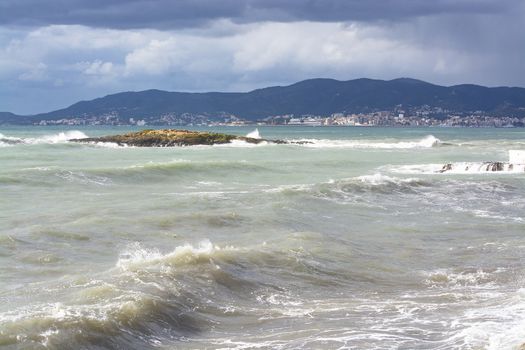 Aqua colors on stormy Mediterranean Mallorca coast on a winter day.