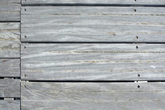 Soft gray brown wood board background texture with lined planks